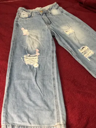 Calça jeans wide leg via ônix infantil.
