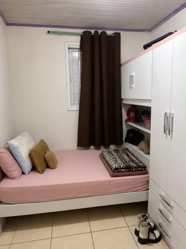 Guarda roupa com cama embutida