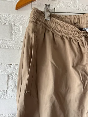 Calça Nike bege 
