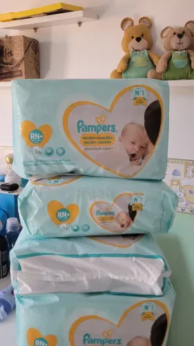 5 pcts FRALDAS PAMPERS RN COM 36 UNIDADES