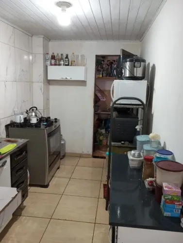 Casa com edícula a venda 
