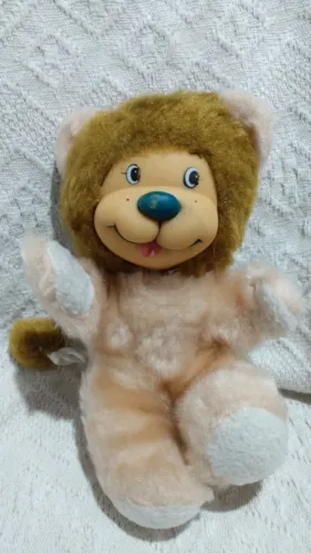 Pelúcia brinquedo antigo leãozinho cara de borracha.