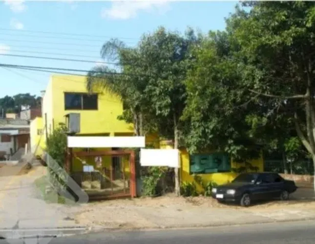 Casa comercial 153m2 privativos 2 vagas de garagem no bairro Cavalhada