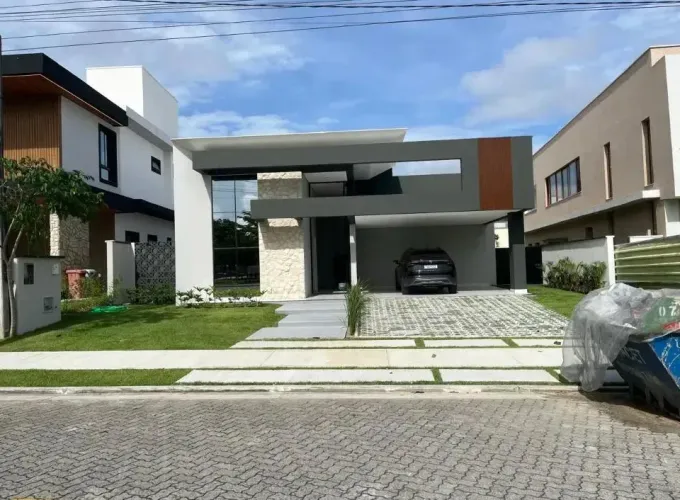 Casa em Condomínio na Cidade Alpha TERRAS 02 - de 218m²/ 04 Suítes/ Frente para o clube.