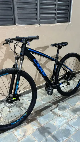 Bicicleta Aro 29 MTB Oggi Hacker Sport 21v Shimano Tourney