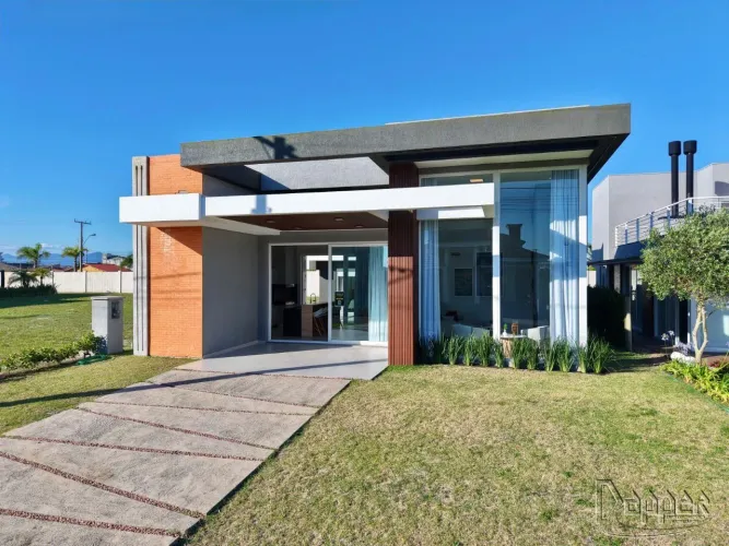 Casa em condomínio à venda no bairro Beira Mar com 218m² e 4 dormitórios/quartos.