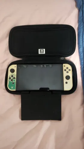 Nintendo Switch OLED Zelda + 4 jogos físicos + controle extra + acessórios