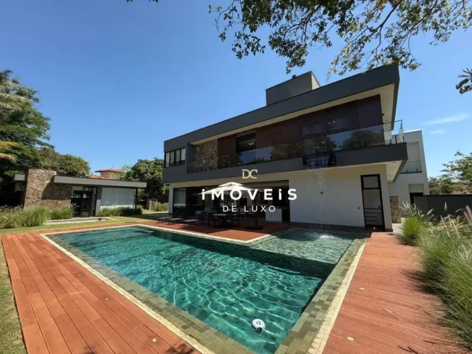 Casa belíssima mobiliada com 4 suítes e quadra de beach tênis no Condomínio Terras de São