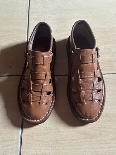 Aprecata de couro feitas a mão 