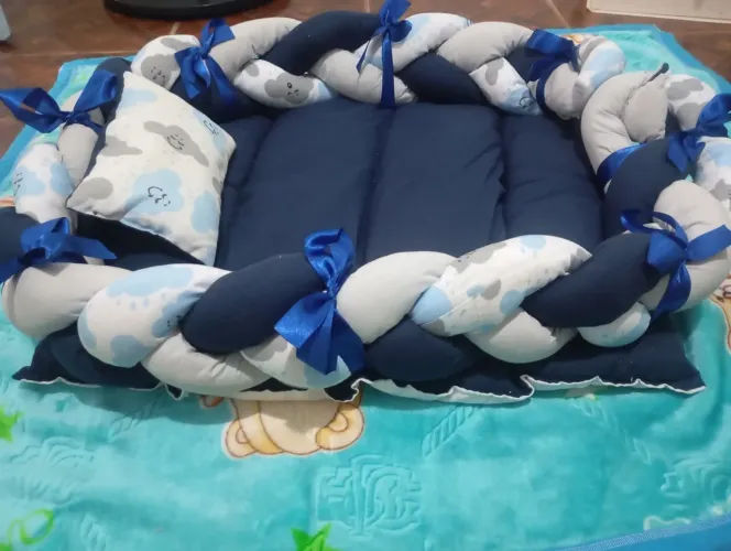 Ninho redutor de berço