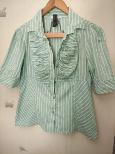 TVZ CAMISA ALGODÃO TAM 42 65,00<br>ALTURA 63cm<br>Ombro 44cm