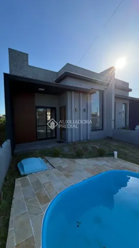 Casa com piscina em Capão da Canoa