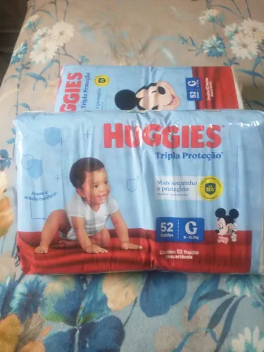 Pacotes de fraldas G Huggies tripla proteção , com validade próximo