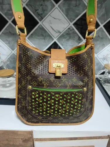 Bolsa usada de couro 100rs negocio