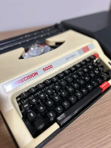 Máquina brother super deluxe 5000