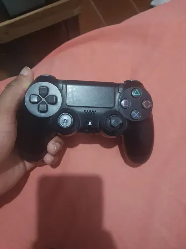 Troco em jogo de ps4, controle original