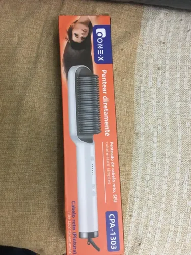 Vendo essa escova alisadora 110 e 220v