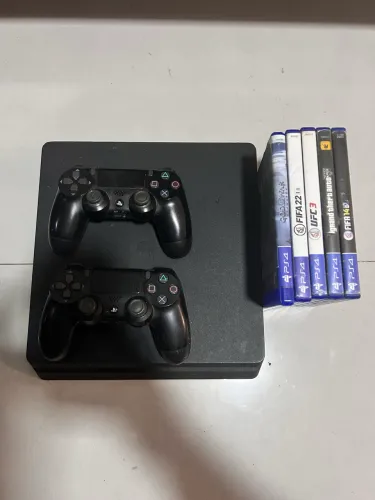 Vendo ou troco PS4 1T + dois Controles + 5 jogos mídias físicas 