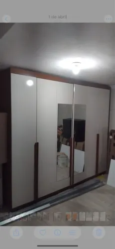 Guarda roupa casal  vendo ou troco por Tv , tem 2,70 de altura de 1,50 de largura 
