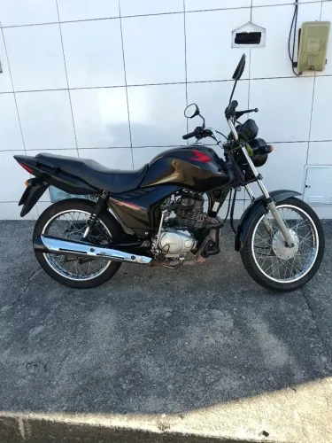 Moto revisada, pneus dianteiro e traseiro novos, kit tração zero, ipva pago.