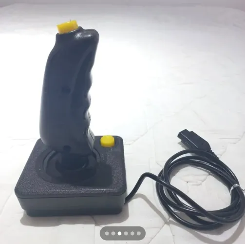 Atari dactar com 1manete e 1 cartucho