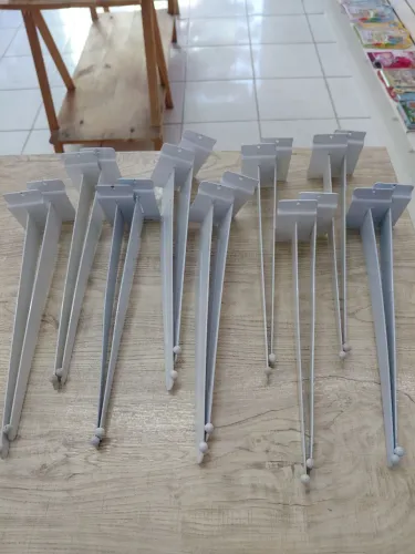 Suporte faca para prateleira de painel canaletado