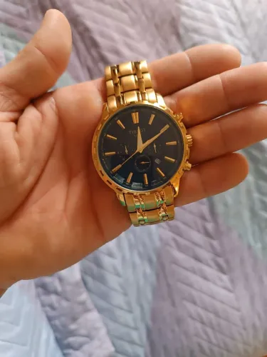 Relógio dourado Tissot lindo