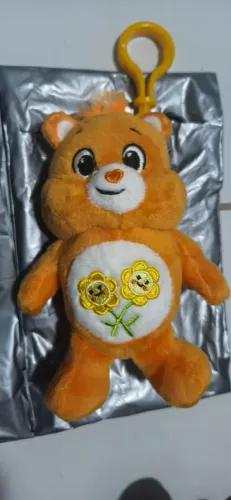 Ursinho carinhoso cacau show laranja flor pelúcia chaveiro