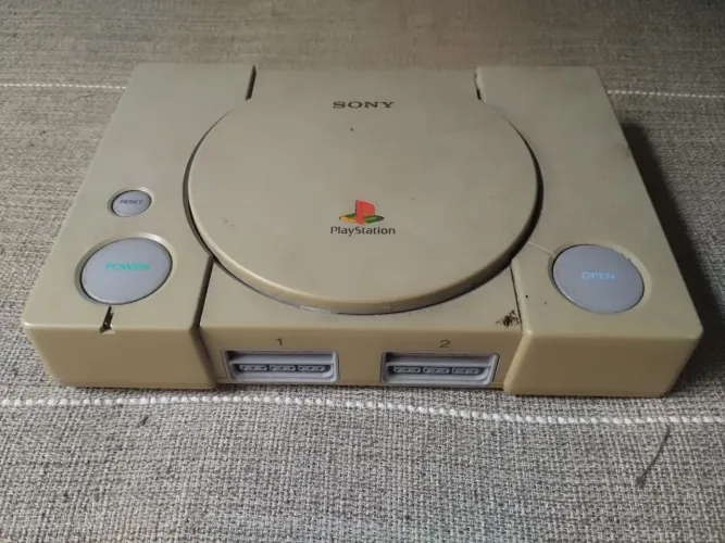 Playstation One FAT SCPH 7001 defeito no leitor.
