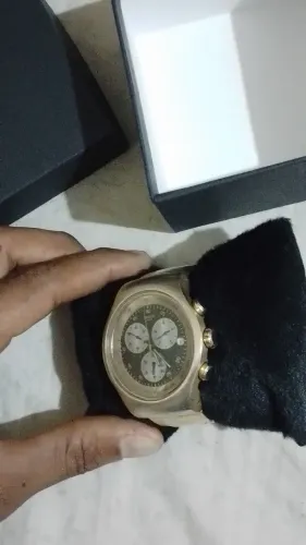 Swatch cara preta girando tudo preço de banana