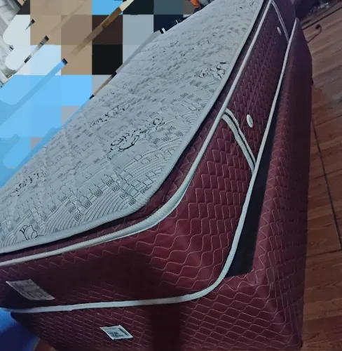Cama box solteirão com colchão em mola em sacada 