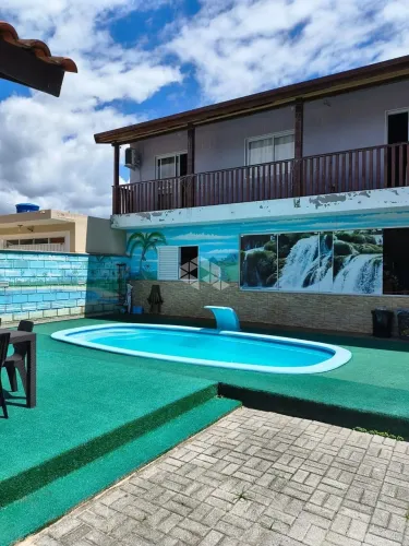 Casa à Venda a150m da Praia do Sonho - Terreno Amplo com Piscina e Edícula Completa