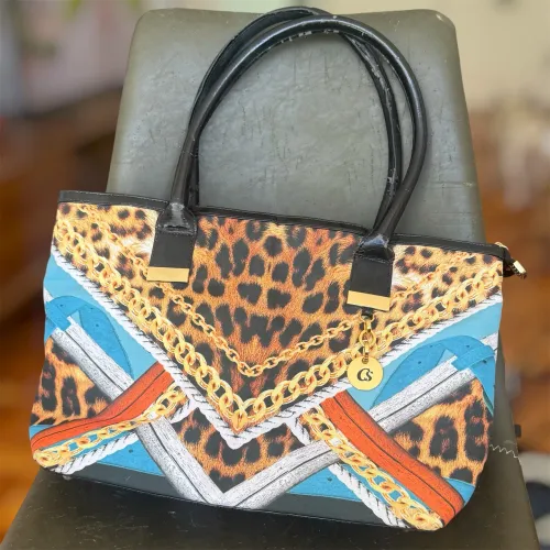 Bolsa Carmen Steffens animal print (edição limitada)