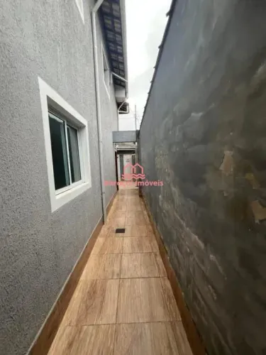 Sobrado em condomínio à venda, 55m² por R$ 299.000 - Maracanã - Praia Grande/SP