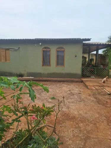 Casa com dois terrenos