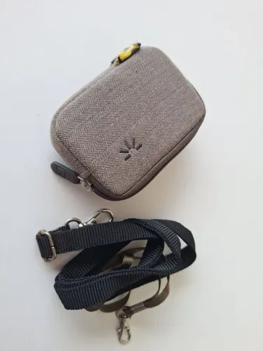 Capa de proteção para câmera fotográfica