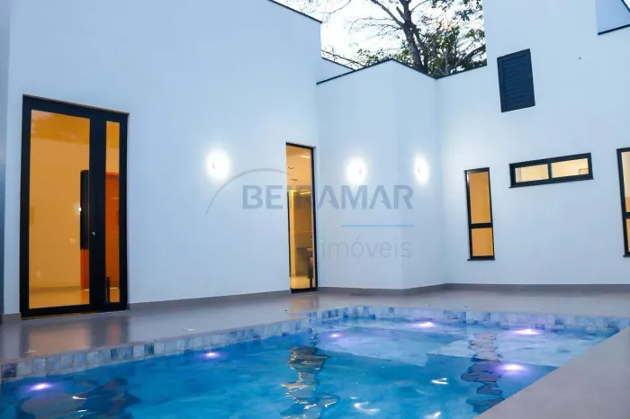 Casa alto padrão, 3 suítes, piscina aquecida e churrasqueira Condomínio Jardim Botânico/D