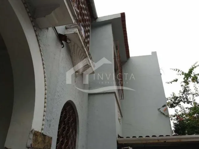 Cultura e Boemia: Casa Duplex com terreno nos fundos em excelente localização de Santa Ter