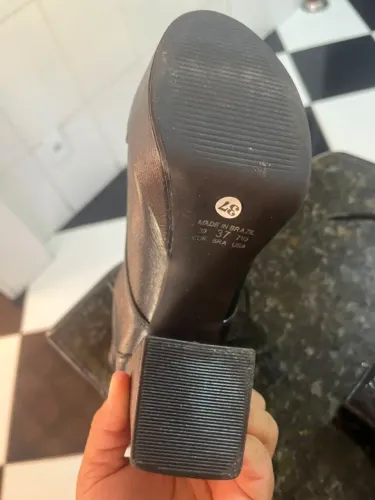 Bota de couro de salto