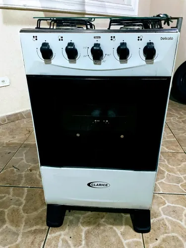Fogão novíssimo excelente, entrego com taxa.