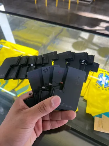 Baterias retirada original iphone tenho pra todos