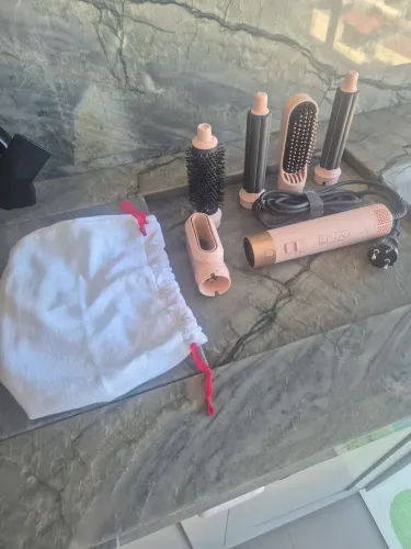 Vendo Kit escova modeladora e cachos ENZO importado.