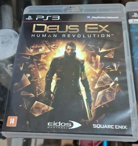 Jogo Deus Ex Human Revolution para PS3 Mídia Física 