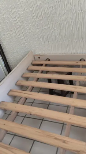 Extrato de cama com cabeceira
