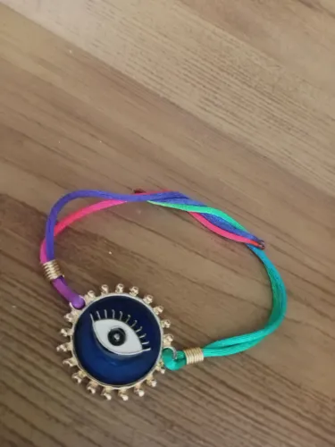Pulseira com pingente de olho