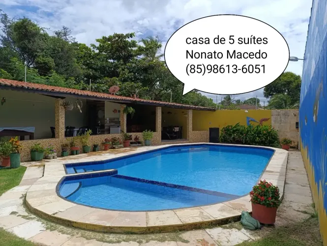 Casa de Praia com 5 Suítes, Piscina e Lazer Completo!