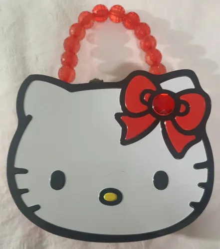 Bolsinha de Lata HELLO KITTY ORIGINAL. VEM COM BRINDE.