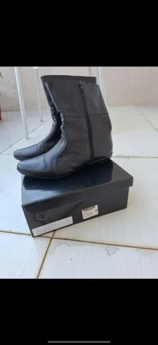 Um  par  de potas semi novas só usei uma vez 