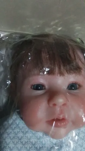 BEBÊ REBORN 48 CM COM CORPINHO TODO EM SILICONE E OLHOS AZUIS