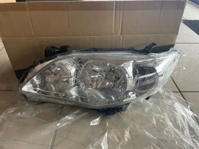 Farol Corolla 2012/14 novo Marca RF